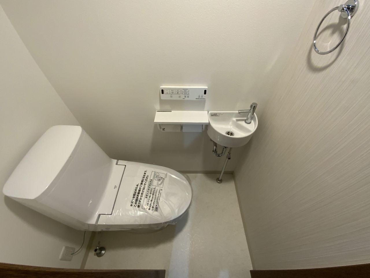 洗濯機置き場を2階から1階へ移動して、家事動線をスムーズに。毎日をもっと快適に