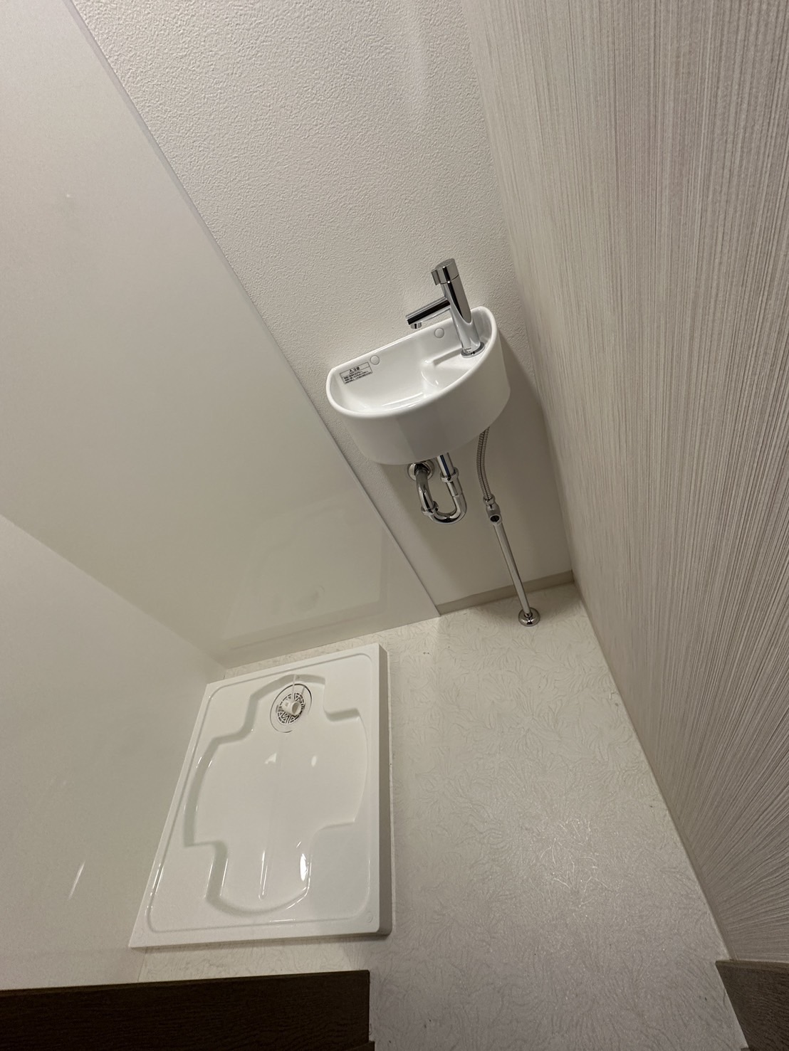洗濯機置き場を2階から1階へ移動して、家事動線をスムーズに。毎日をもっと快適に